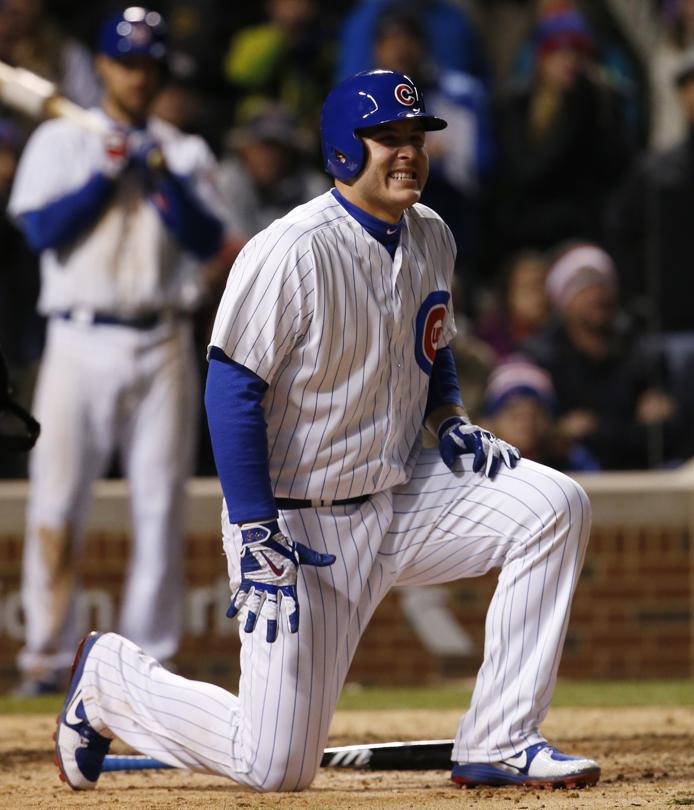 Chicago Cubs Anthony Rizzo reacts after being hit by a pitch from New York Yankees pitcher Aroldis Chapman during the ninth inning of an interleague baseball game Sunday