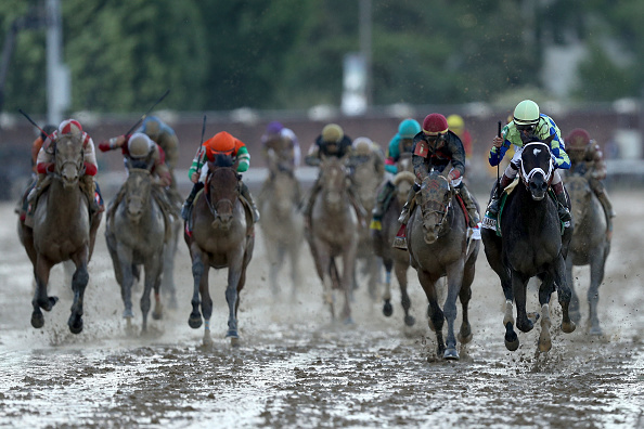 Kentucky Derby day begins in cold and wet conditions