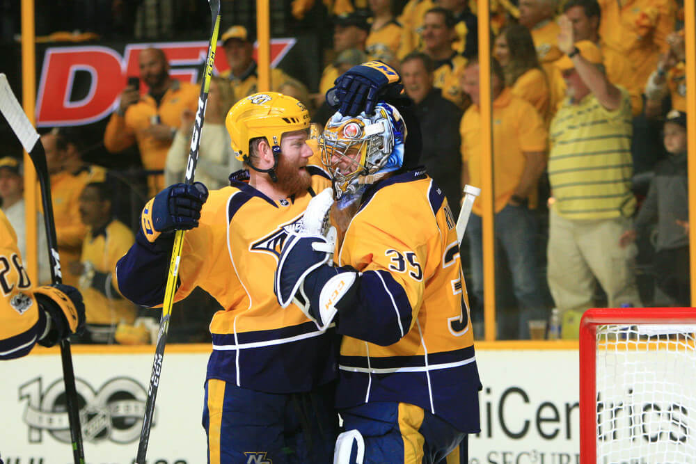 Nashville Predators defenseman Matt Irwin congratulates Nashville Predators goalie Pekka Rinne following Game Three of Round Three of the Stanley Cup Playoffs between the Nashville Predators and the Anaheim Ducks held