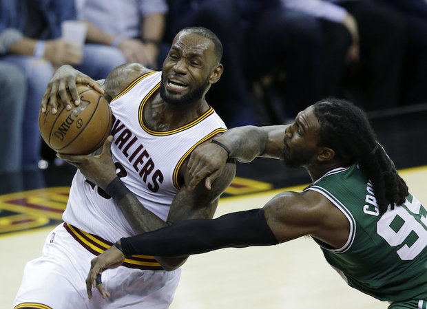 Cleveland Cavaliers Le Bron James goes up for a shot against Boston Celtics Jae Crowder during the second half of Game 4 of the NBA basketball Eastern Conference finals Tuesday