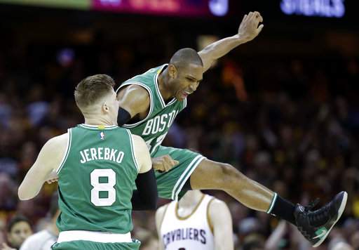 LeBron struggles, exchanges words with fan after loss