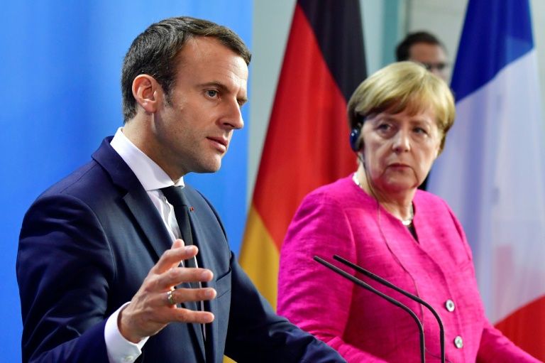 Macron Merkel say ready to change EU treaties if needed