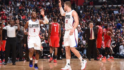 LOS ANGELES CA- APRIL 10 Chris Paul #3 and Blake Griffin #32 of the LA Clippers high-five during a game against the Houston Rockets