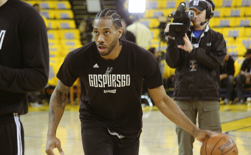 San Antonio Spurs forward Kawhi Leonard warms ups before Game 1 of the Western Conference Finals on May 14