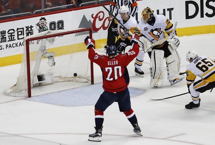 Washington Capitals center Lars Eller, from Denmark celebrates as teammate Alex Ovechkin scores against the Pittsburgh Penguins during Game 5 in the second-round of the NHL hockey Stanley Cup playoffs Saturday May 6 in Washin