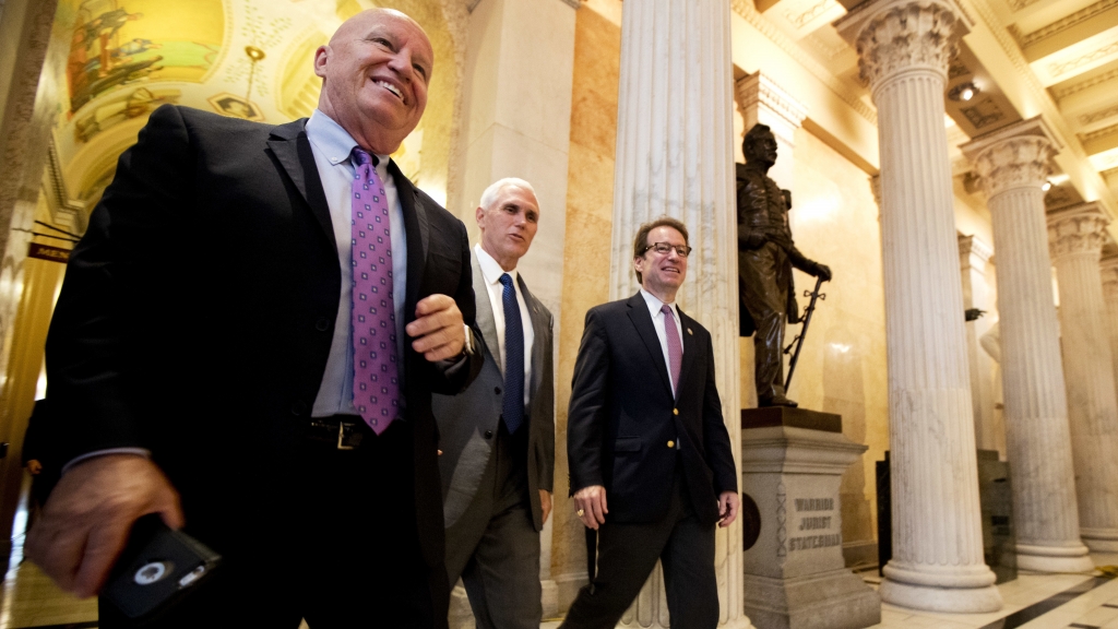 Rep. Kevin Brady R-Texas left walks with Vice President Mike Pence and and Rep. Peter Roskam R-Ill. on Capitol Hill on Monday