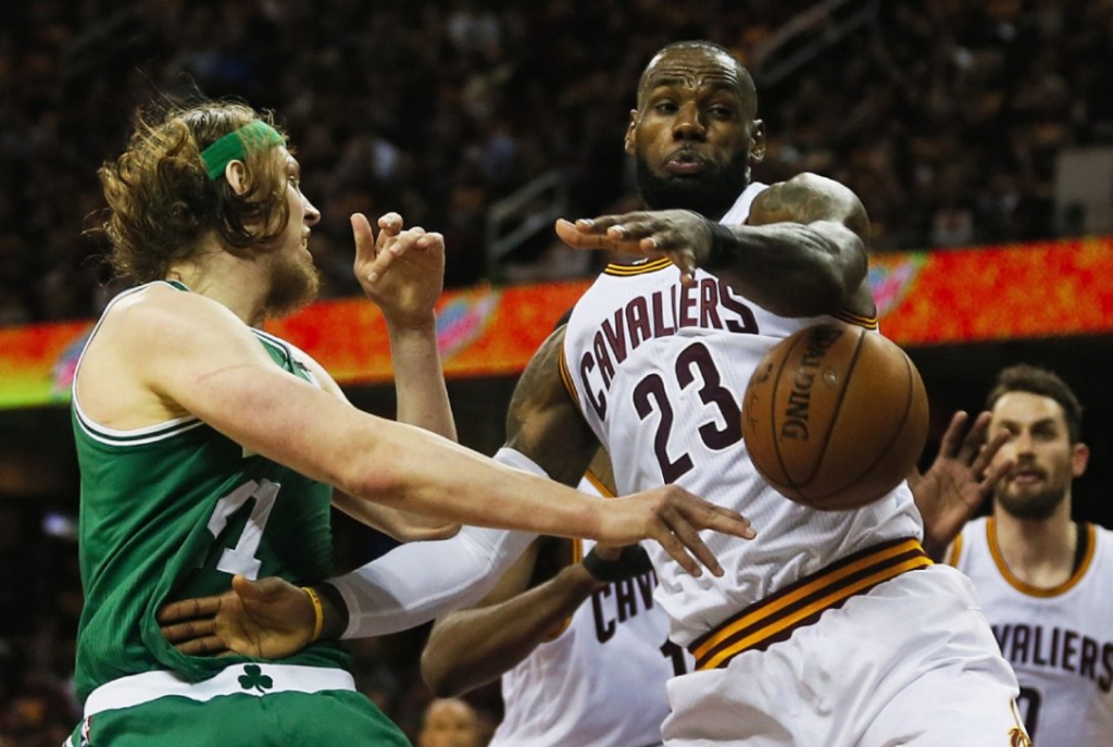 Cleveland Cavaliers forward Le Bron James blocks Boston Celtics centre Kelly Olynyk of Kamloops B.C. during Game 3 of the Eastern Conference final on Sunday. The Celtics won 111-108 to get back in the series with James making only four of 13 shots and