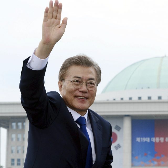 South Korean president Moon Jae-in celebrates in Seoul