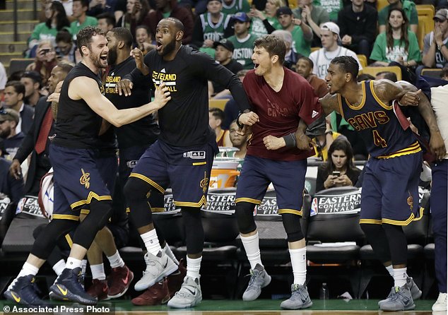 Cleveland Cavaliers from left Kevin Love Le Bron James Kyle Korver and Iman Shumpert celebrate a basket during the second half of Game 5 of the NBA basketball Eastern Conference finals against the Boston Celtics