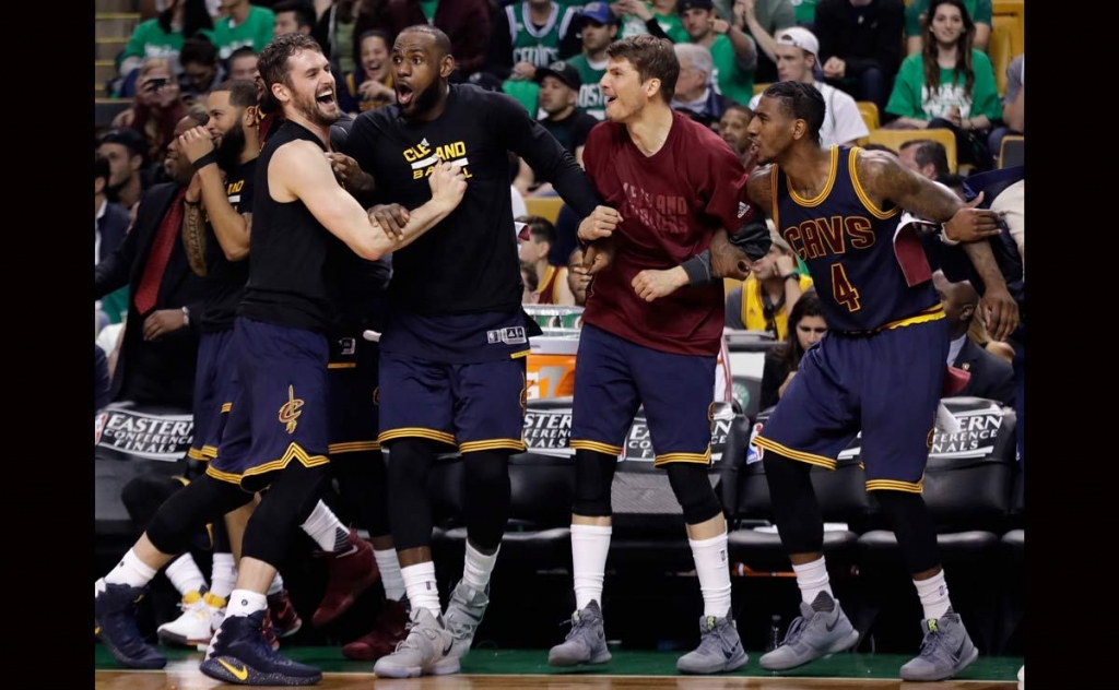 Cleveland Cavaliers from left Kevin Love Le Bron James Kyle Korver and Iman Shumpert celebrate a basket during the second half of Game 5 of the NBA basketball Eastern Conference finals against the Boston Celtics on Thursday