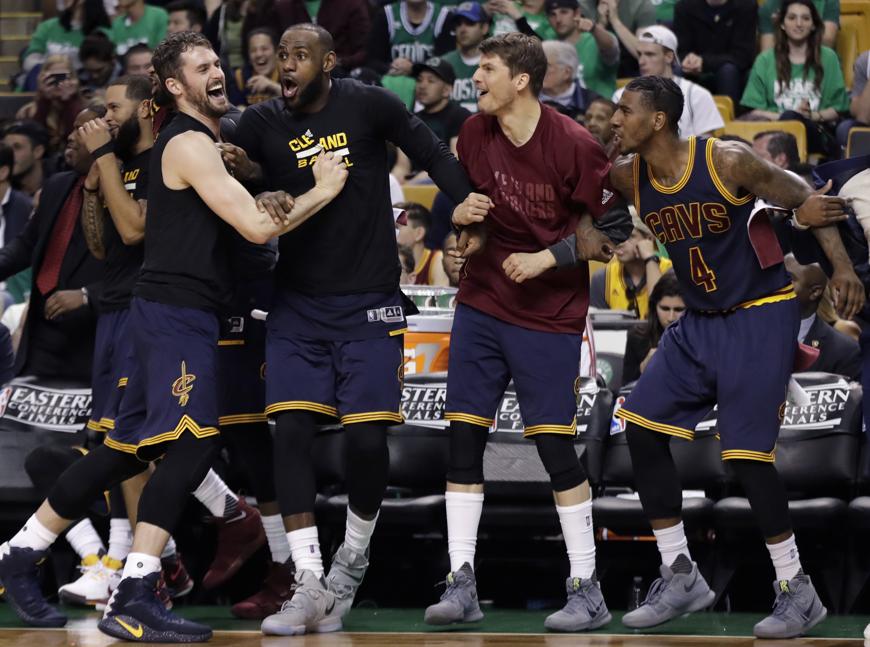 Cleveland Cavaliers from left Kevin Love Le Bron James Kyle Korver and Iman Shumpert celebrate a basket during the second half of Game 5 of the NBA basketball Eastern Conference finals against the Boston Celtics on Thursday