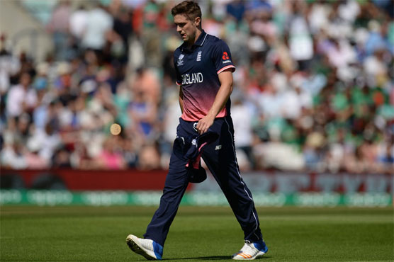 Chris Woakes has been ruled out of the rest of the Champions Trophy competition with a side strain