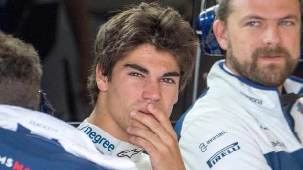 Williams driver Canadian Lance Stroll left gets ready for the first practice session Friday at the F1 Canadian Grand Prix Montreal. via AP