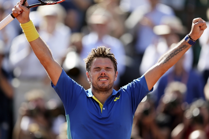 Switzerland's Stan Wawrinka reacts after defeating Britain's Andy Murray in their semifinal match of the French Open tennis tournament at the Roland Garros stadium Friday June 9 in Paris