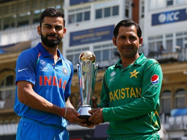 India's captain Virat Kohli and Pakistan's captain Sarfraz Ahmed hold the trophy as they pose for a photgraph at The Oval in London