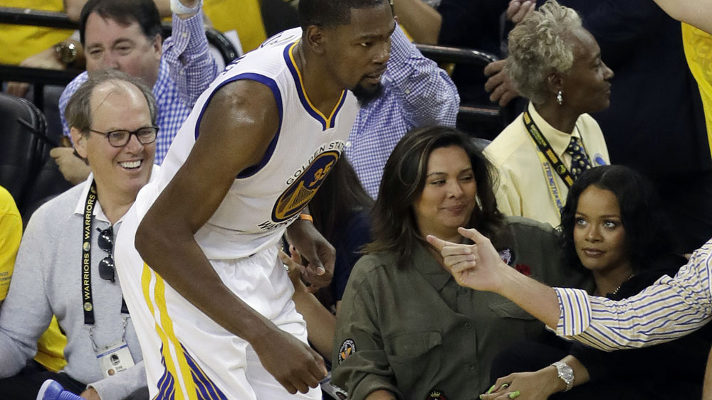 NBA Finals Music star Rihanna and Golden State Warriors player Kevin Durant exchange words during game one