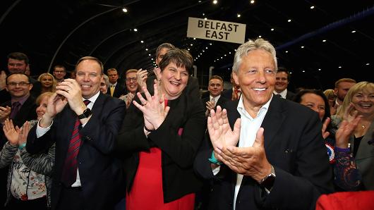 Democratic Unionist Party deputy Nigel Dodds, leader Arlene Foster and Former Democratic Unionist Party Leader Peter Robinson