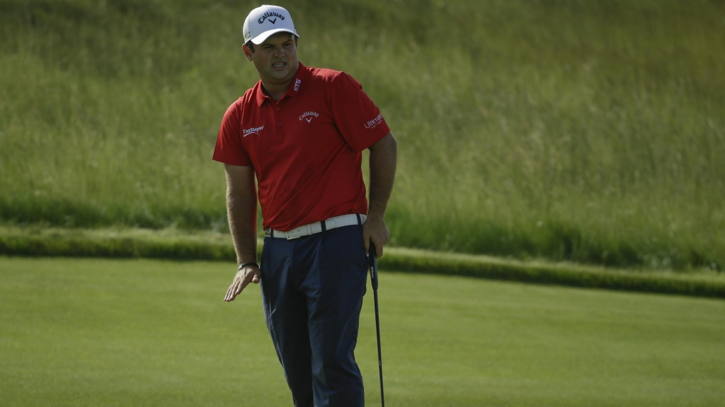 Patrick Reed sets early clubhouse target at rain-softened Erin Hills