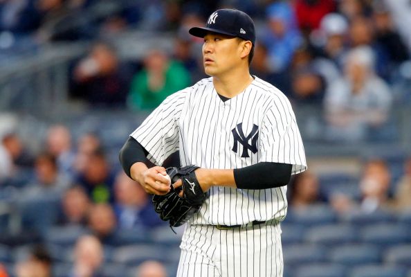 Masahiro Tanaka of the New York Yankees stands