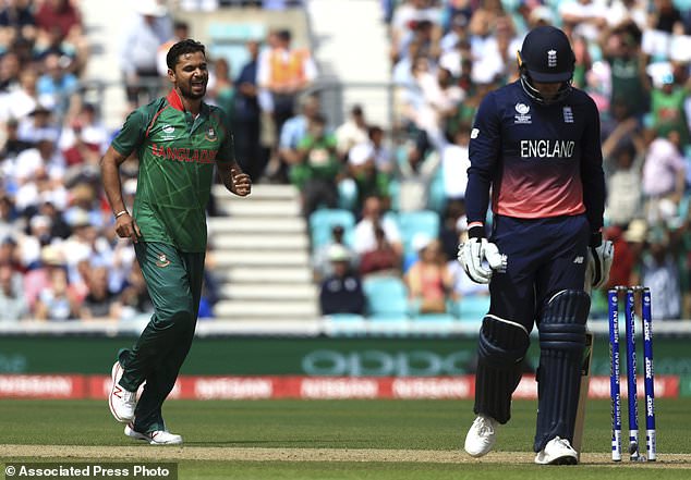 Bangladesh's Mashrafe Mortaza celebrates the wicket of England's Jason Roy during the ICC Champions Trophy cricket match between England and Bangladesh at the Oval cricket ground in London Thursday