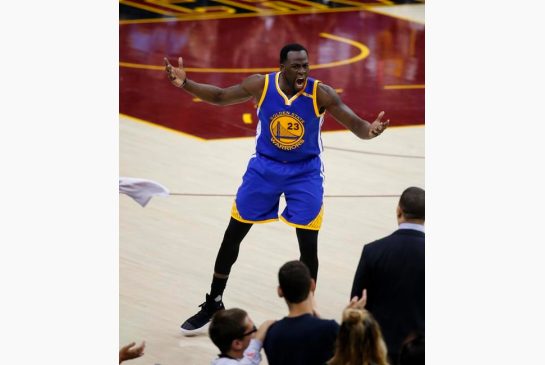 Golden State Warriors forward Draymond Green reacts to a foul call during the first half of Game 4 of the basketball team's NBA Finals against the Cleveland Cavaliers in Cleveland Friday