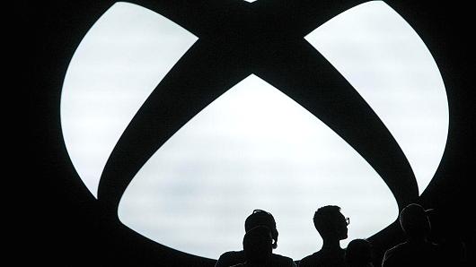 Silhouettes of attendees are seen during the Microsoft Corp. Xbox event