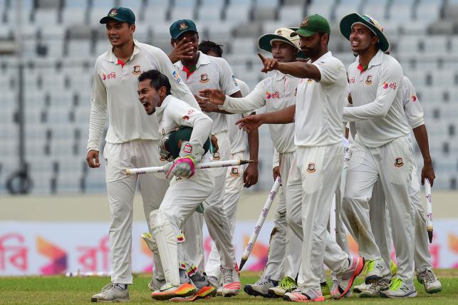 Bangladeshi cricket captain Mushfiqur Rahim celebrate after winning the first Test cricket match between Bangladesh and Australia at the Sher-e Bangla National Cricket Stadium in Dhaka