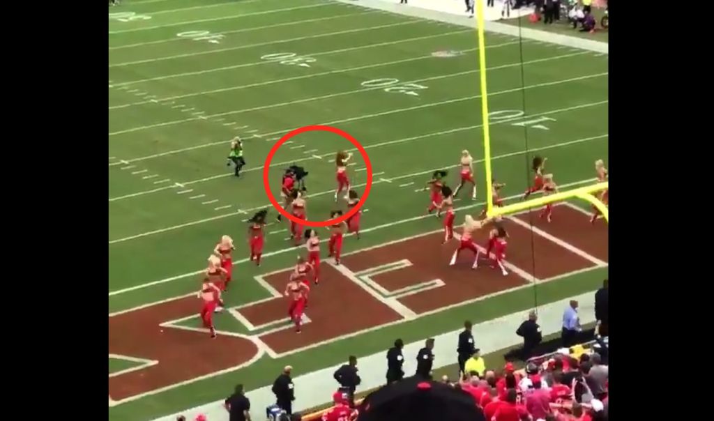 Cameraman accidentally destroys Chiefs cheerleader with a brutal blindside hit