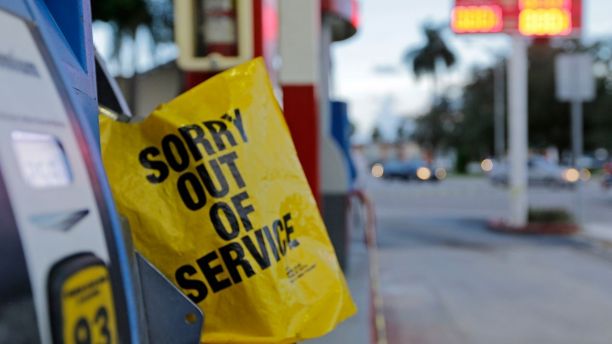 A gas pump is covered after a gas station ran out of gas Thursday Sept. 7 2017 in Miami