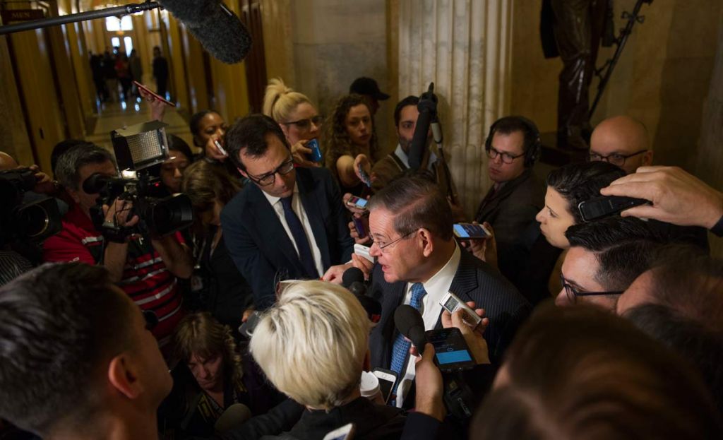 Sen. Robert Menedez D-N.J. speaks with reporters after attending a Congressional Hispanic Caucus meeting with White House Chief of Staff John Kelly on Capitol Hill in Washington Wednesday Jan. 17 2018