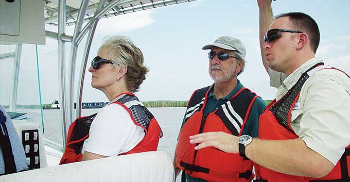 Oil spill commissioners Dr. Donald Boesch center and Frances Ulmer former Alaska lieutenant governor on left visit the Louisiana Gulf Coast in 2010 to see impacts of the BP spill