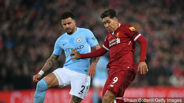 Kyle Walker of Manchester City and Roberto Firmino of Liverpool battles for possesion during the Premier League match between Liverpool and Manchester City at Anfield