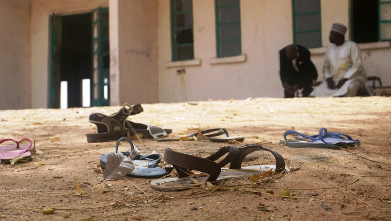 Sandals are strewn in the yard of the Government Girls Science and Technical College in Dapchi Nigeria where over 100 school girls went missing and locals insist they have been kidnapped by Boko Haram jihadists
