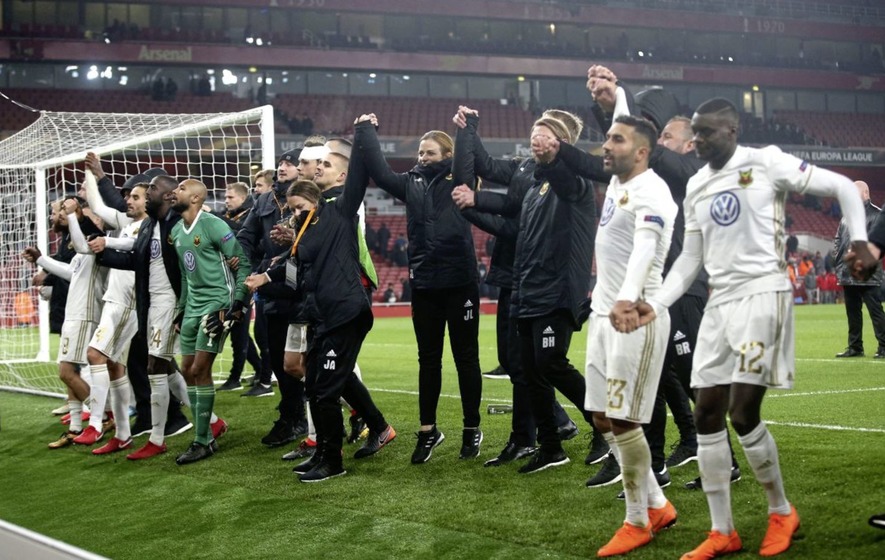 Ostersunds FK celebrate with fans after beating Arsenal at the Emirates Stadium