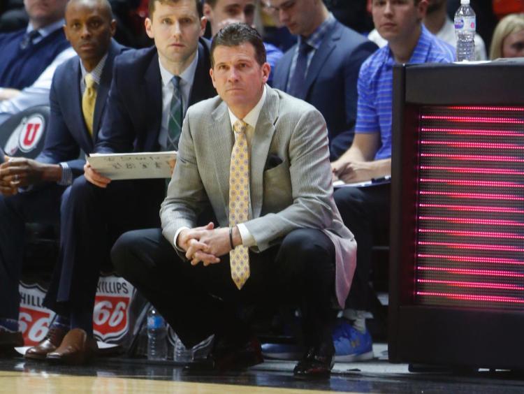 UCLA coach Steve Alford watches the first half of an NCAA college basketball game against Utah in Salt Lake City. Alford who has led the Bruins to the NCAA Tournament for the fourth time in five seasons said