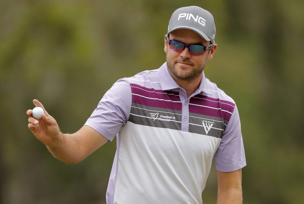 Corey Conners acknowledges the following a putt on the third hole during the third round of the Valspar Championship golf tournament. | AP