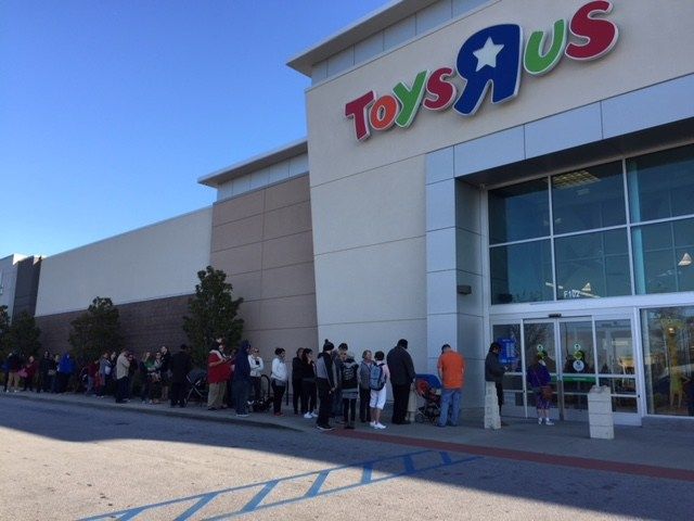 Line of shoppers waiting to enter Toys R Us in Greenville