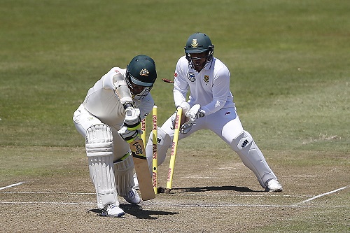 Keshav Maharaj castles Mitchell Starc as the Proteas and Australia continue to play cat and mouse.  AFP