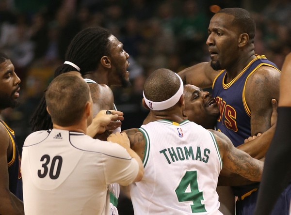 Cleveland Cavaliers center Kendrick Perkins scuffles with Boston Celtics forward Jae Crowder, after a play in which Perkins was called for a flagrant foul. TD Garden on Sunday