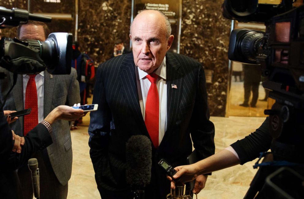 City Mayor Rudy Giuliani talks with reporters in the lobby of Trump Tower in New York Jan. 12 2017. Giuliani has become the face of President Donald Trumps aggressive new legal team