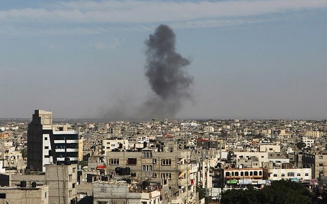 Smoke rises following an Israeli air strike in Rafah in the southern Gaza Strip