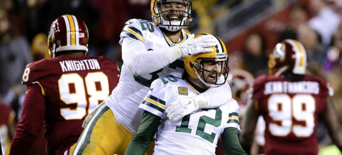 After slow start, Rodgers, Packers overwhelm Redskins 35-18