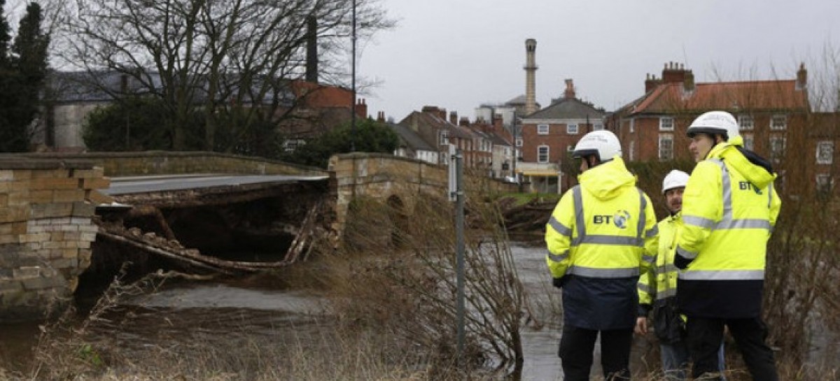 Flood-hit communities face more of the same – plus snow