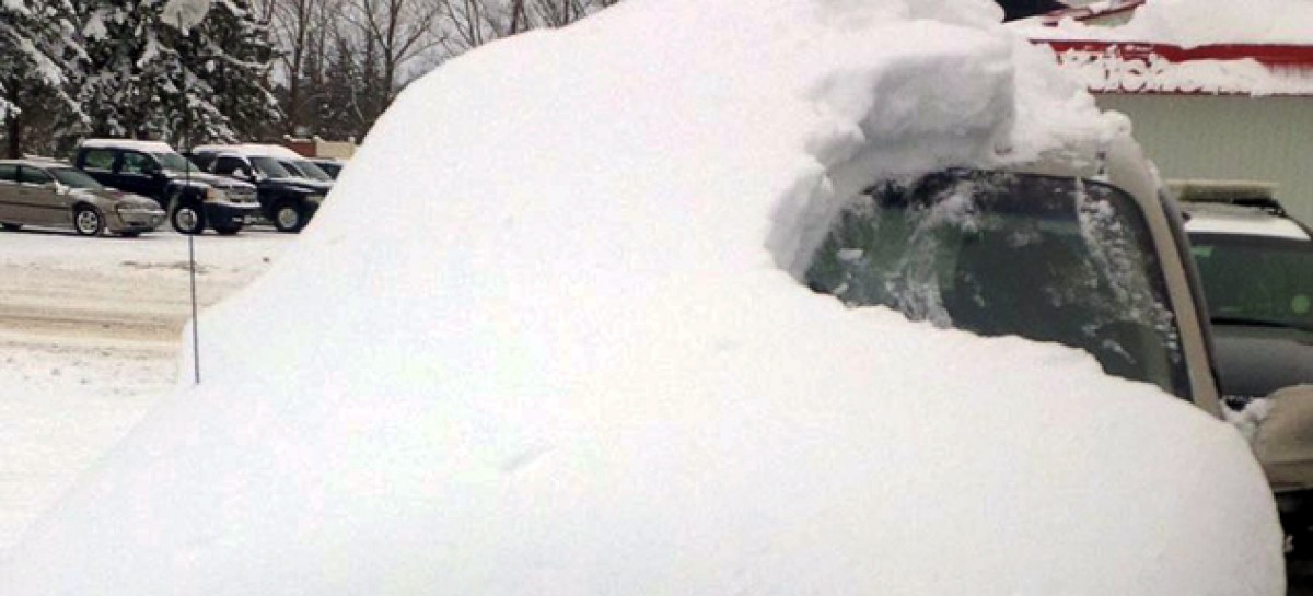 Man Charged after His Car Almost Completely Covered in Snow