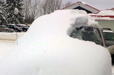 Man Charged after His Car Almost Completely Covered in Snow