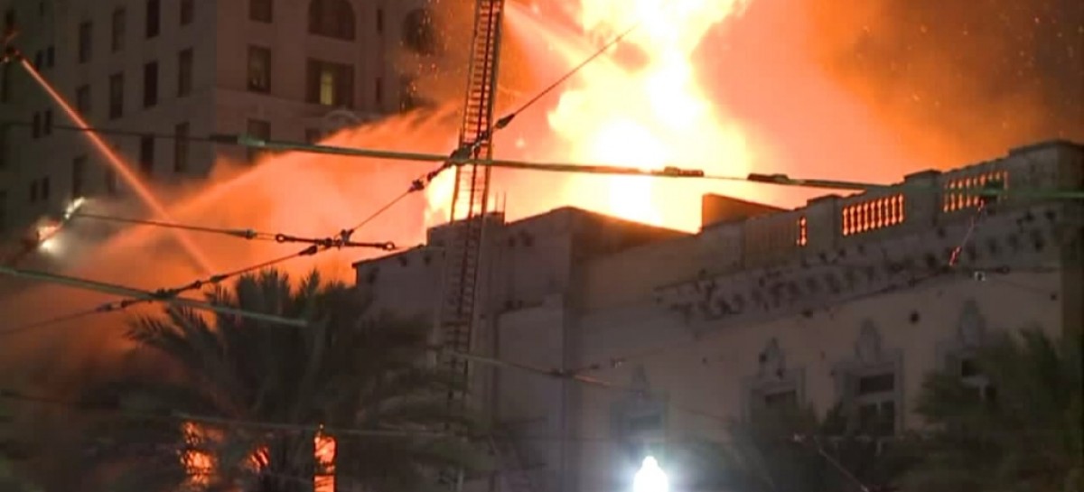 New Orleans firefighters at building fire on Canal Street