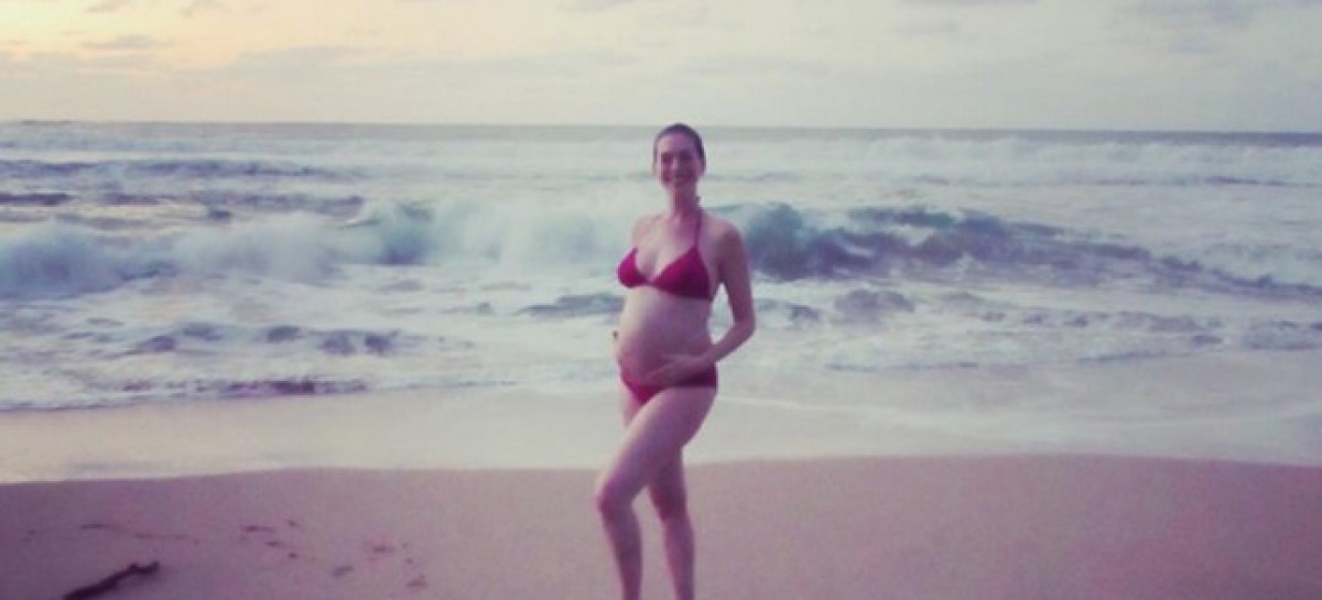 Anne Hathaway confirms pregnancy with gorgeous bikini photo