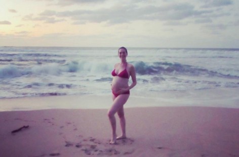 Anne Hathaway confirms pregnancy with gorgeous bikini photo