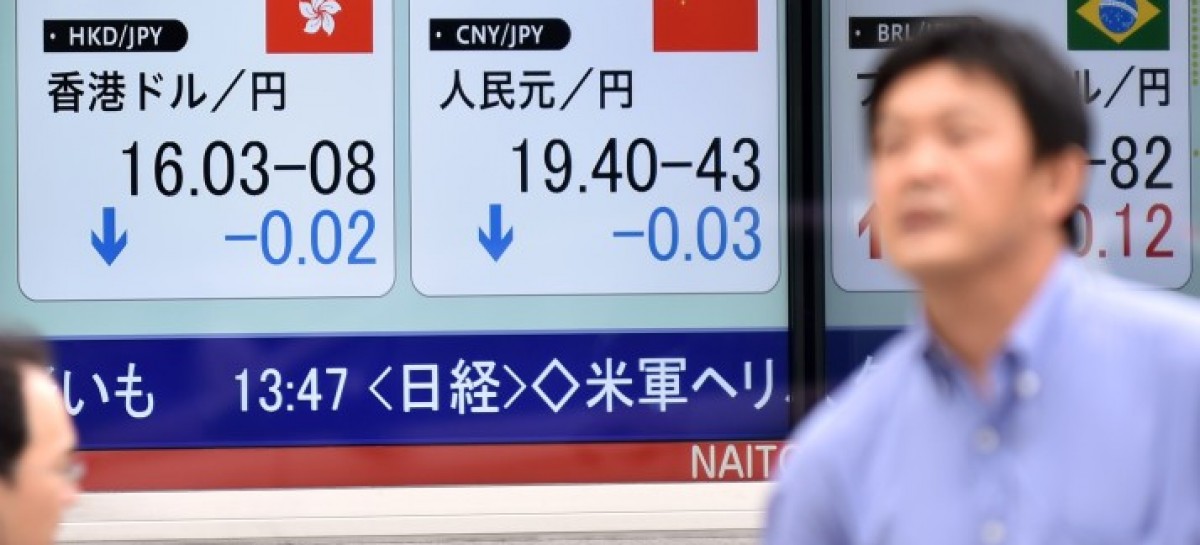 World stocks slide as China trading halted after plunge