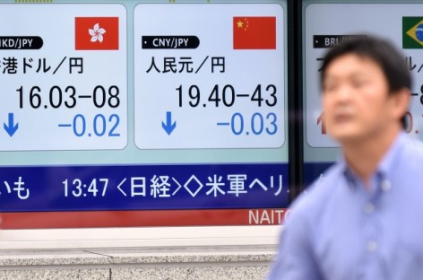 World stocks slide as China trading halted after plunge